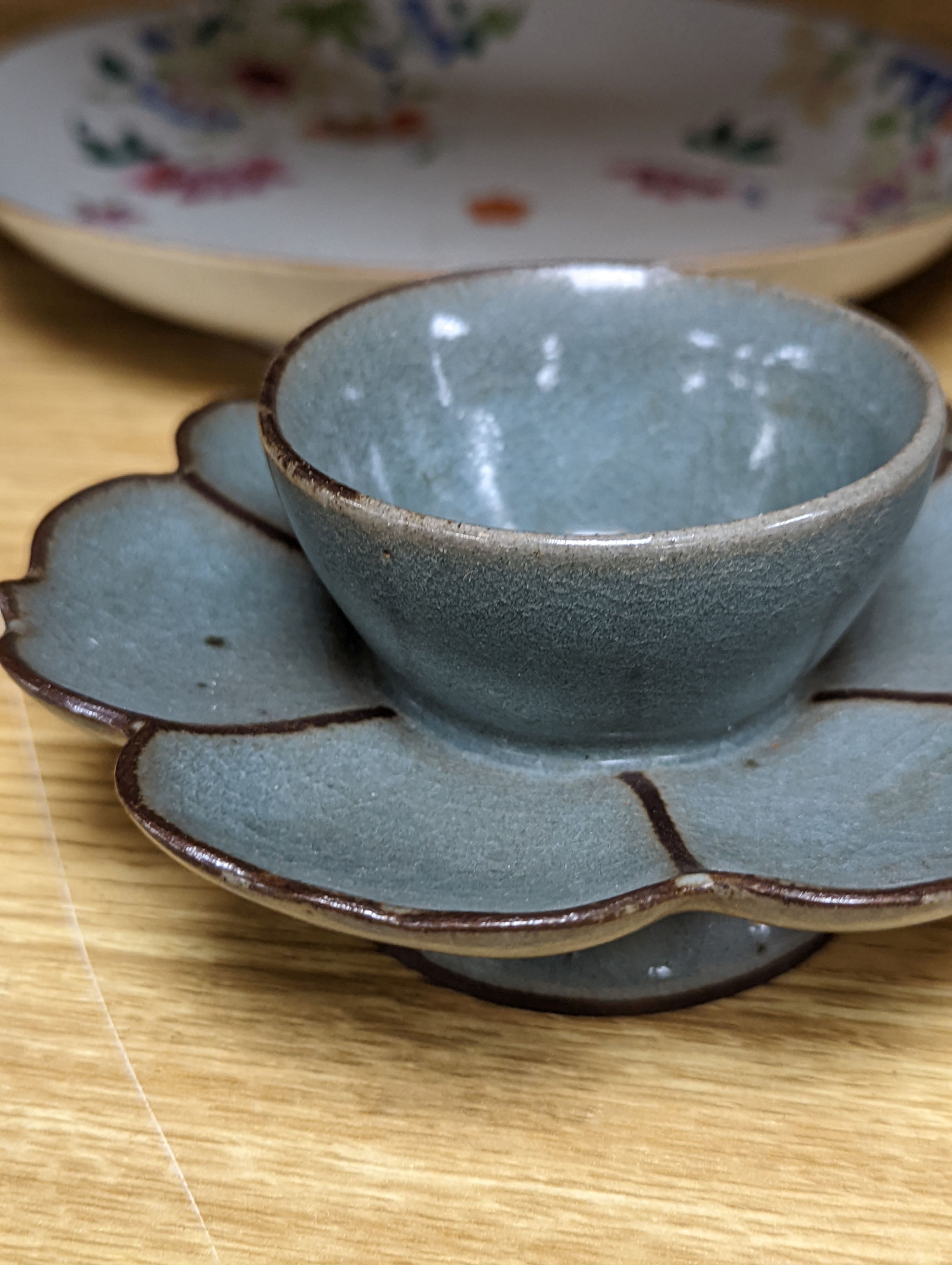 An 18th century Chinese famille rose dish, crackle-glaze stem cup, Beijing glass tea bowl and a Chinese Imari plate. Largest 24cm